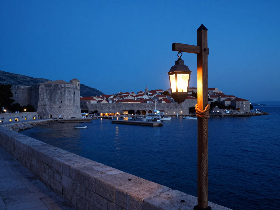 Pre-dawn Dubrovnik Croatia Harbor View with Lantern and Woven Cane Details in in Dubrovnik, Croatia