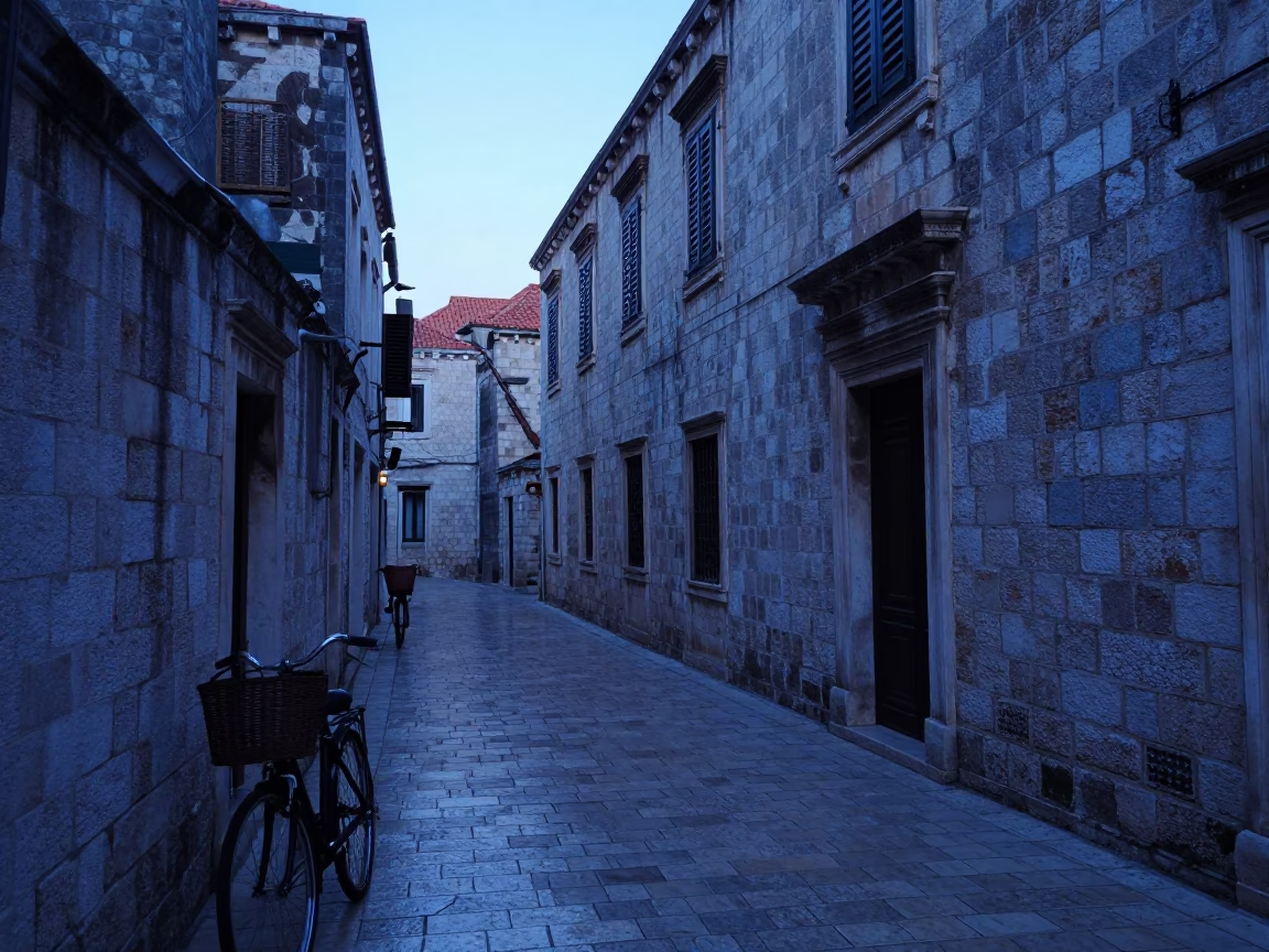 Pre-dawn Dubrovnik streets with bicycle basket and stone architecture in in Dubrovnik, Croatia