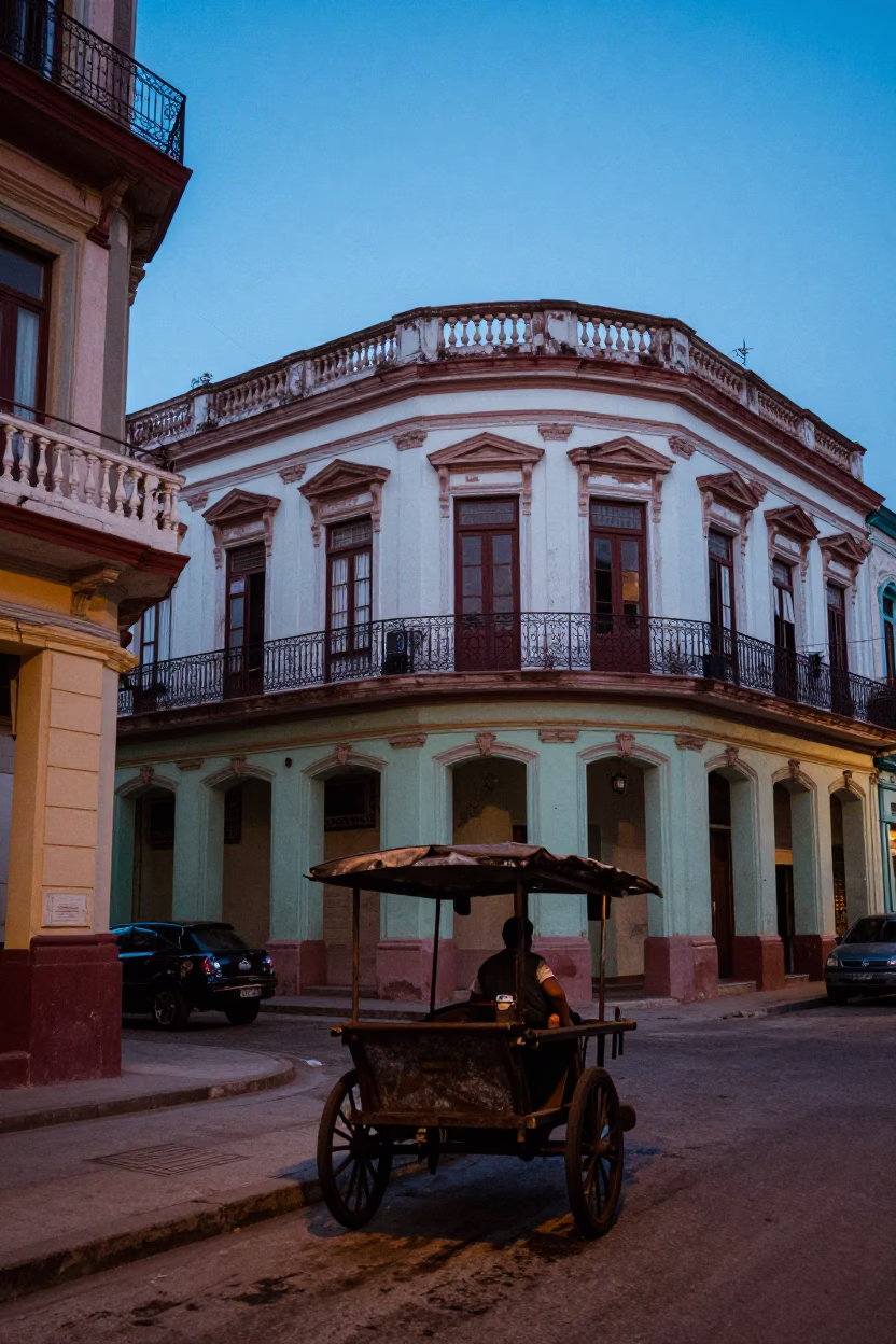 Pre-dawn Havana street scene with colorful colonial architecture and local vendor setup in in Havana, Cuba
