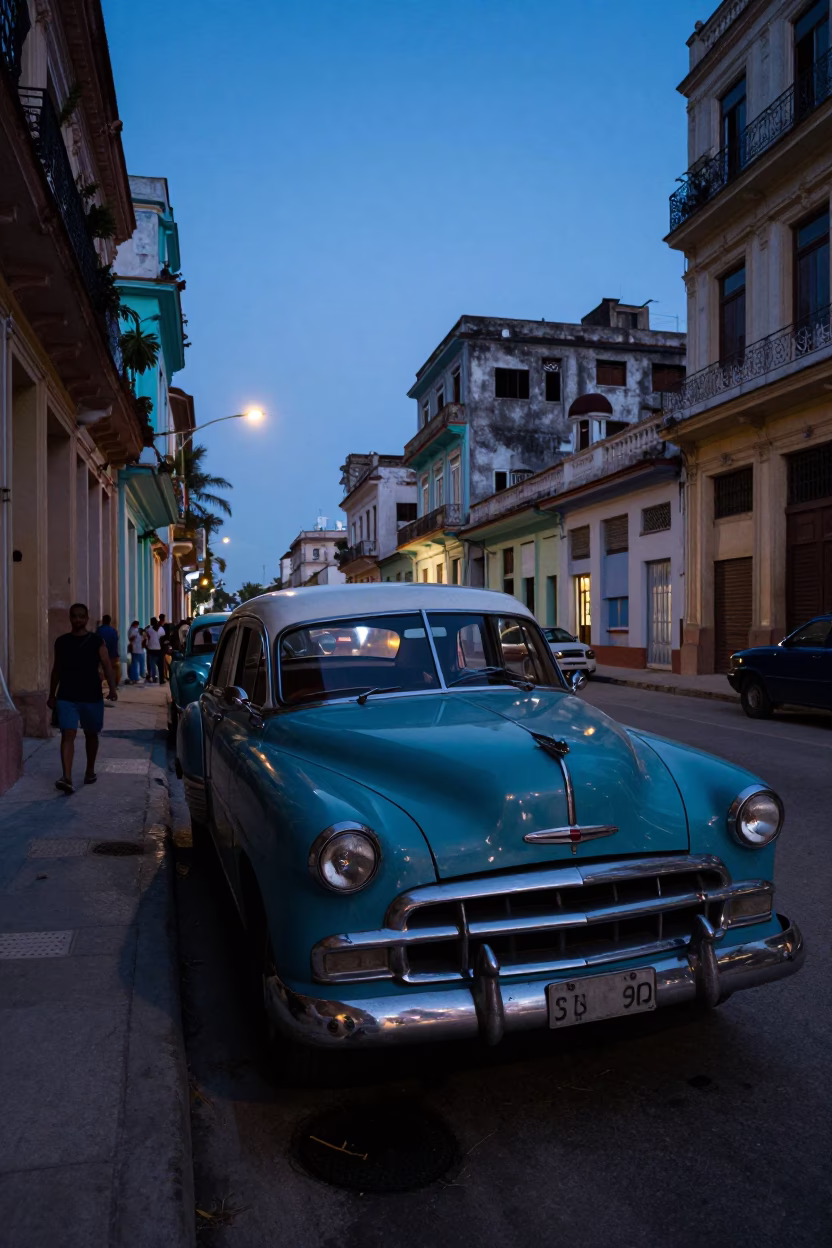 Pre-Dawn Havana Street Scene with Vintage Cars and Local Life in in Havana, Cuba
