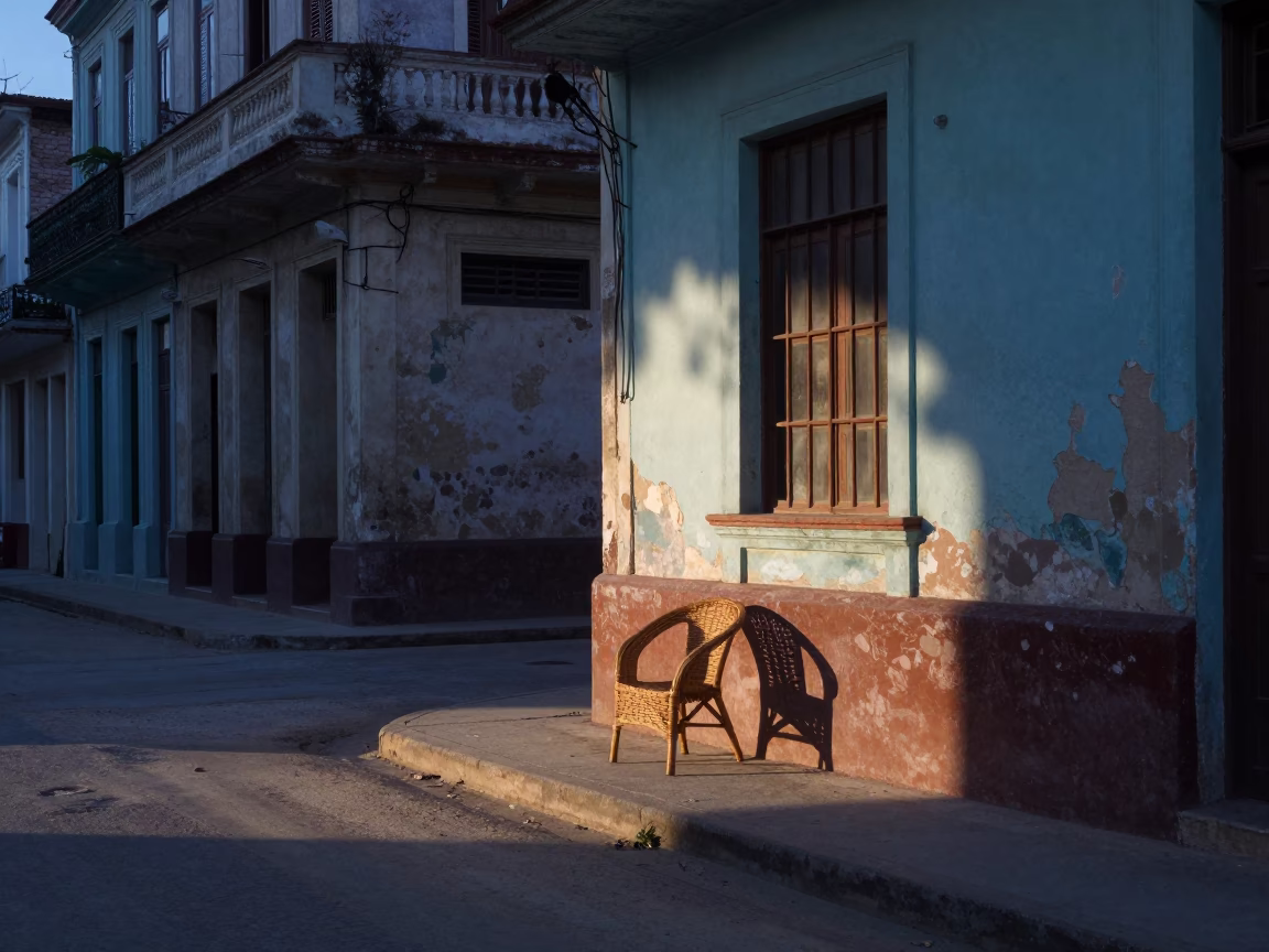 Pre-dawn Havana street scene with wicker shadow and dust on rail in in Havana, Cuba