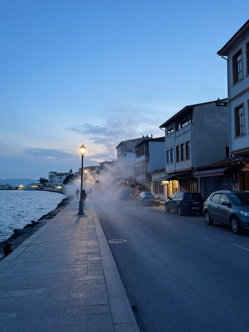 Pre-dawn Izmir Turkey street scene with steam haze and urban details in in Izmir, Turkey
