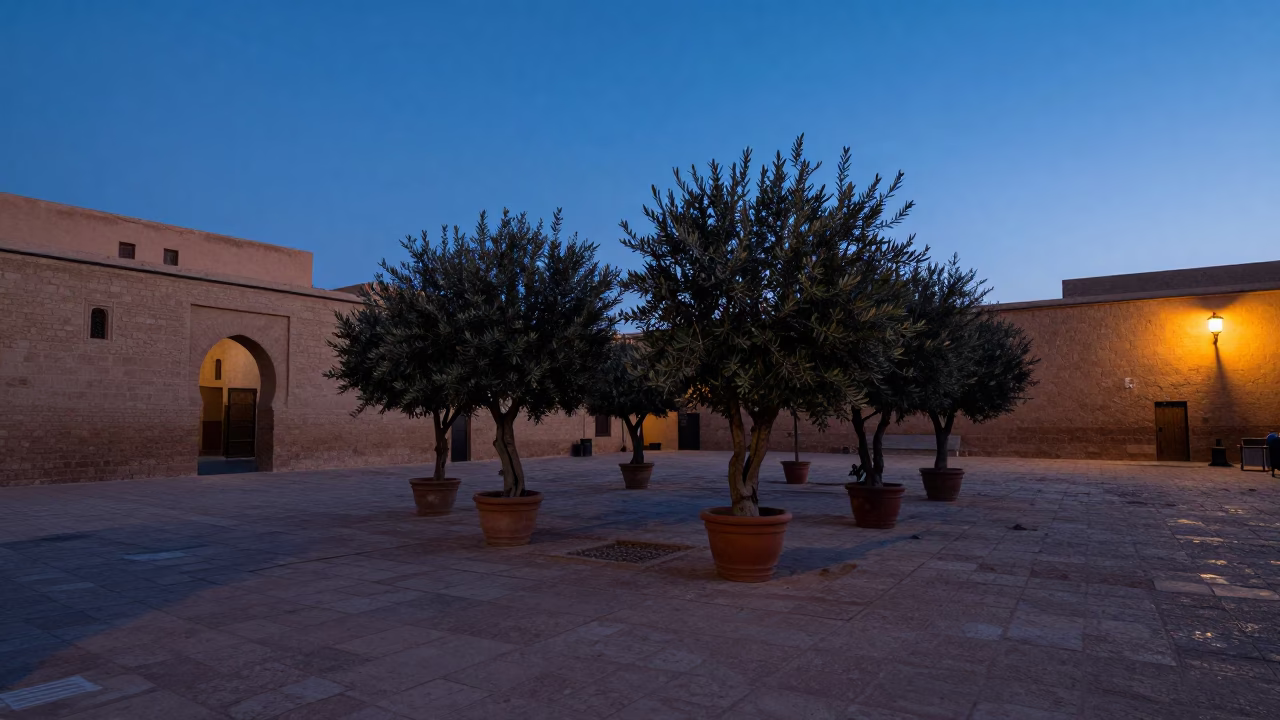Pre-dawn Marrakech Medina Courtyard with Weathered Stone and Morning Light in in Marrakech, Morocco