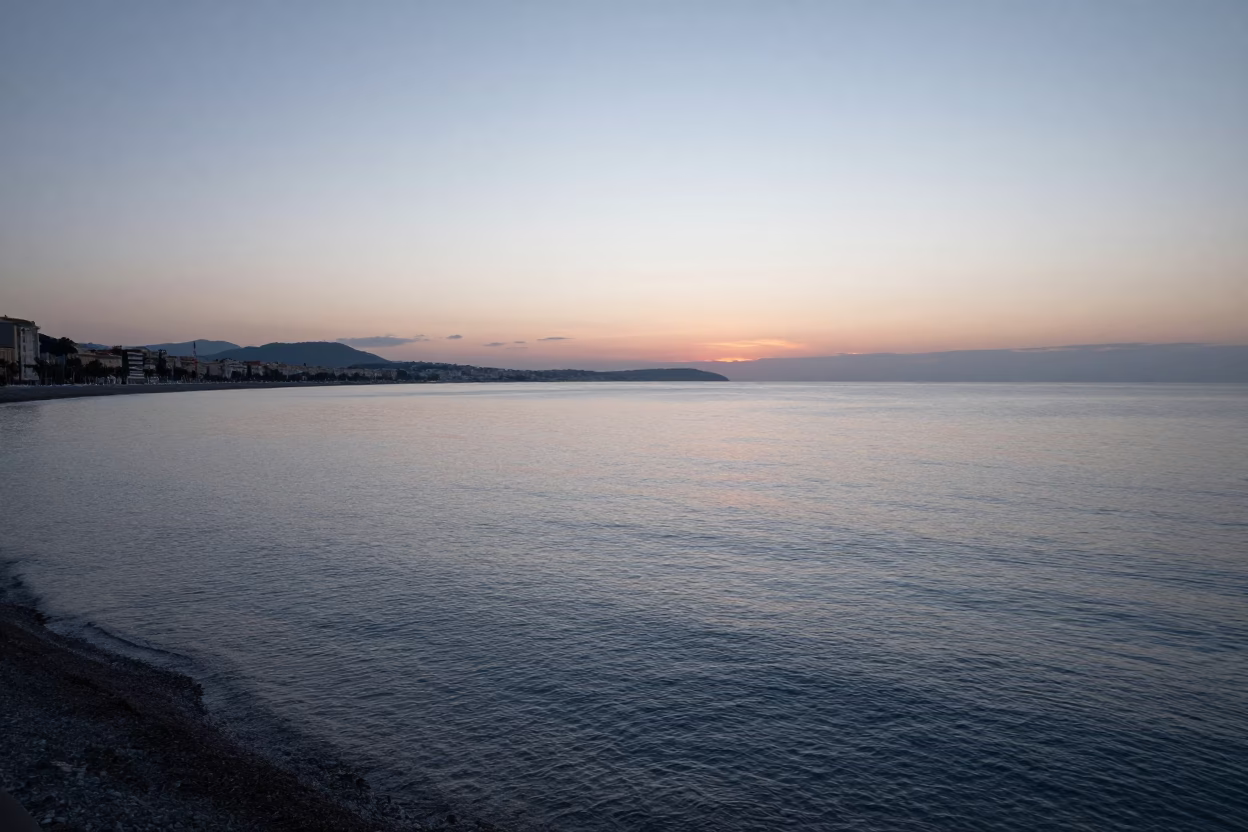 Pre-dawn Mediterranean Coastline View from Nice France with Calm Sea Horizon in in Nice, France