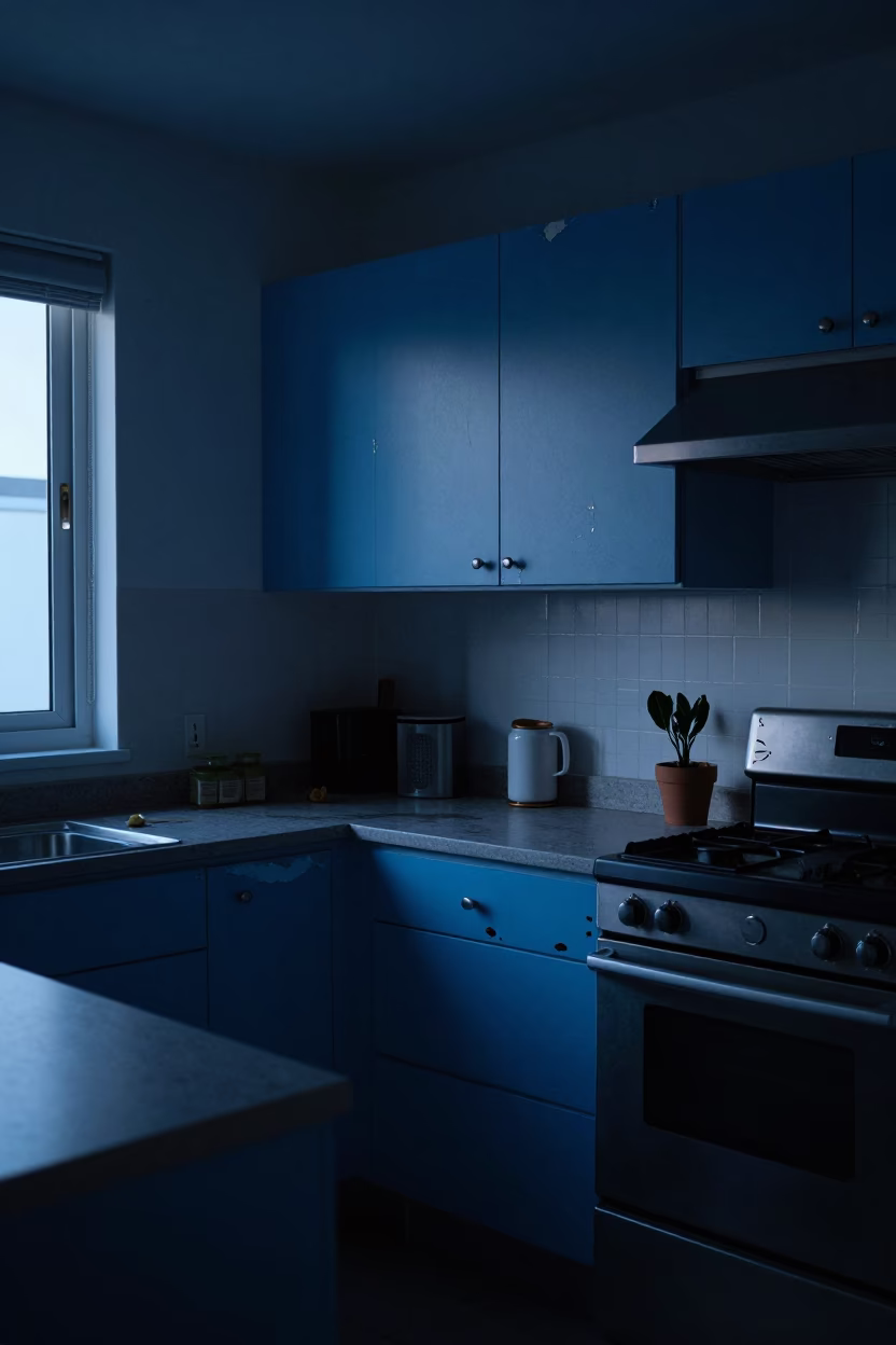 Pre-Dawn Miami Kitchen Interior with Chipped Blue Enamel and Measuring Cups in in Miami, Florida, United States