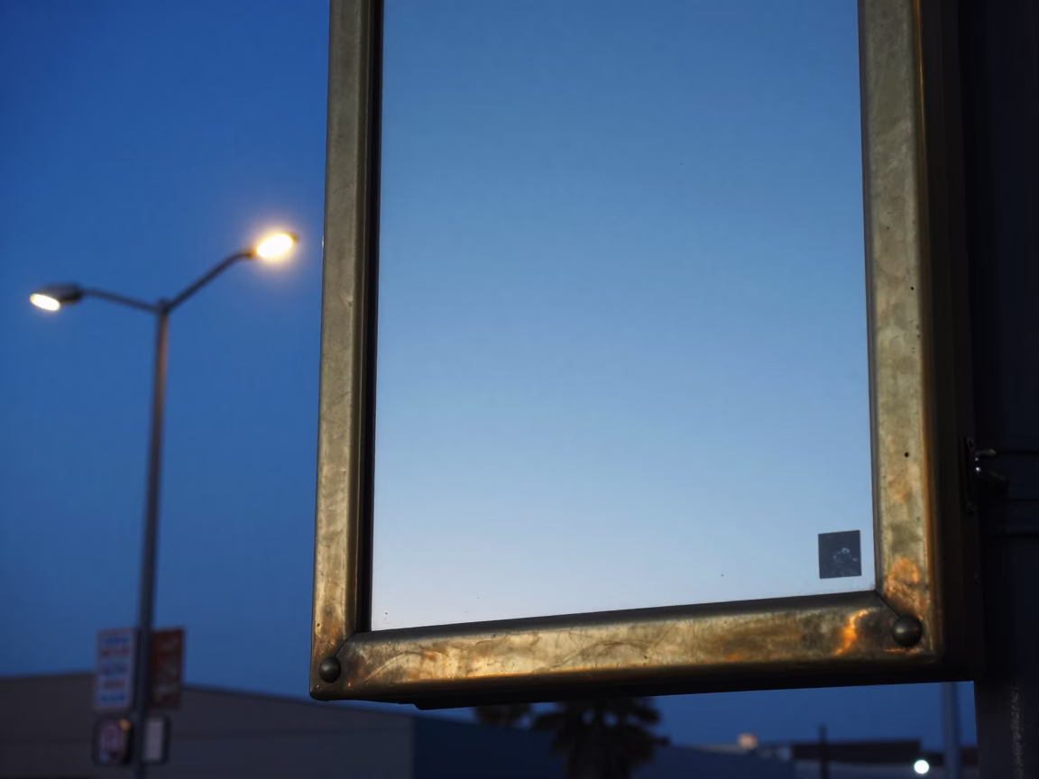 Pre-Dawn San Diego Street Corner with Brass Mirror and Glass Bottle in in San Diego, California, United States