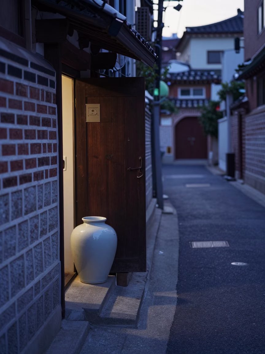 Pre-Dawn Seoul Alleyway with Blue Porcelain Jar and Metal Bucket in in Seoul, South Korea