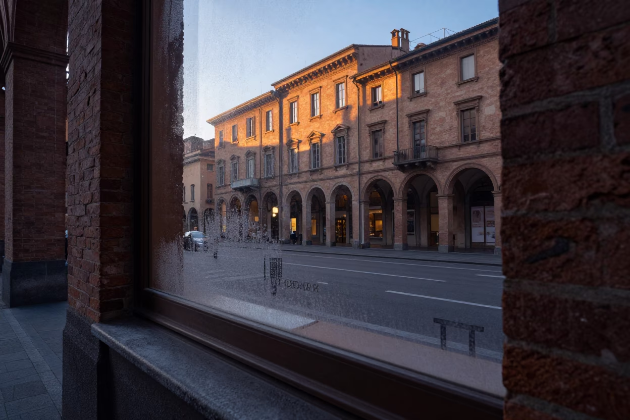 Pre-dawn street scene in Bologna Italy with condensation on window frame in in Bologna, Italy