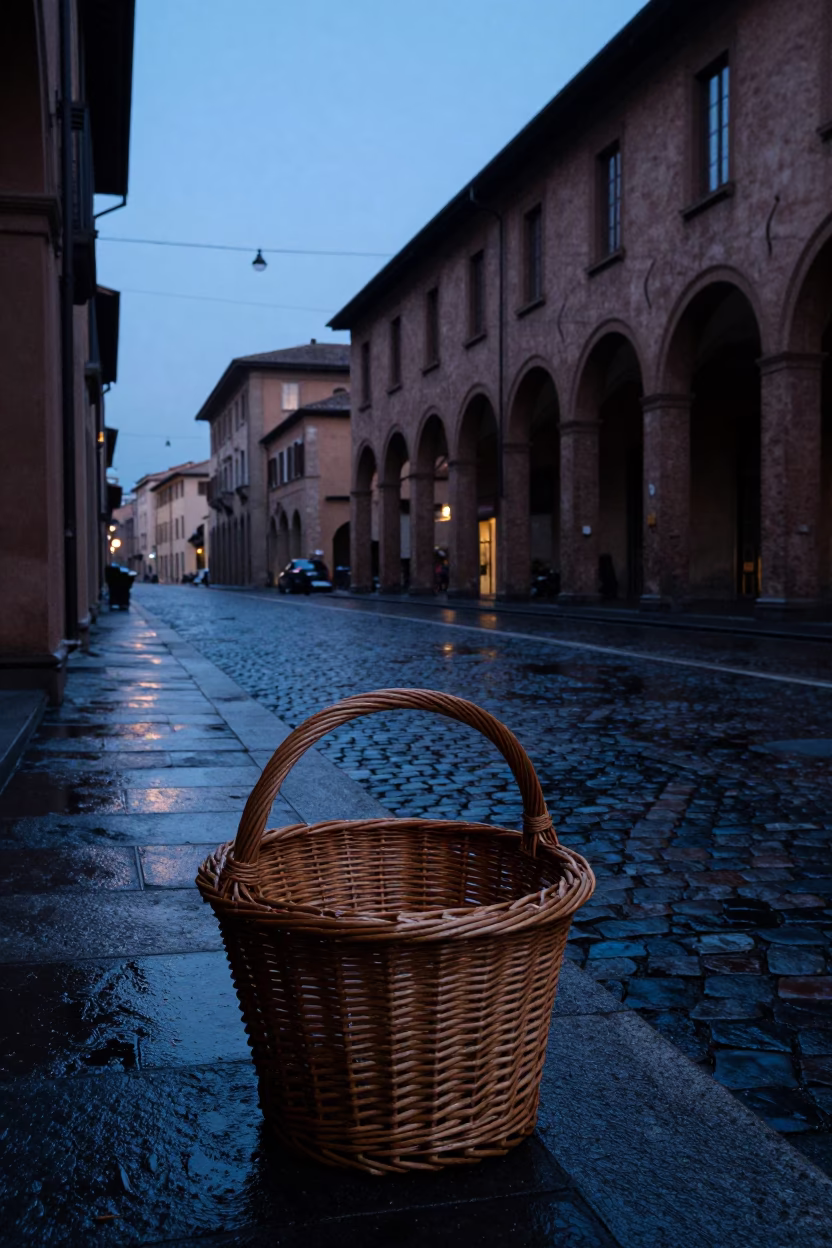 Pre-dawn street scene in Bologna Italy with wicker hamper and early morning light in in Bologna, Italy