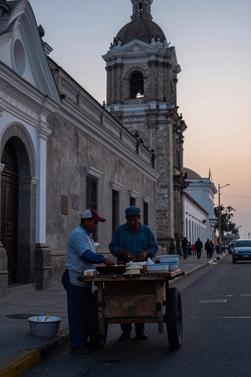 Pre-dawn street scene in Lima Peru with local vendor preparing mole poblano breakfast in in Lima, Peru