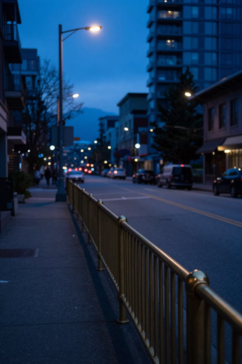 Pre-Dawn Vancouver Street Scene with Polished Brass Rail and Morning Glory Fence in in Vancouver, British Columbia, Canada