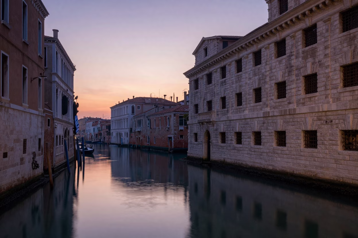 Pre-dawn Venice Canal Reflections and Historic Stone Architecture in in Venice, Italy