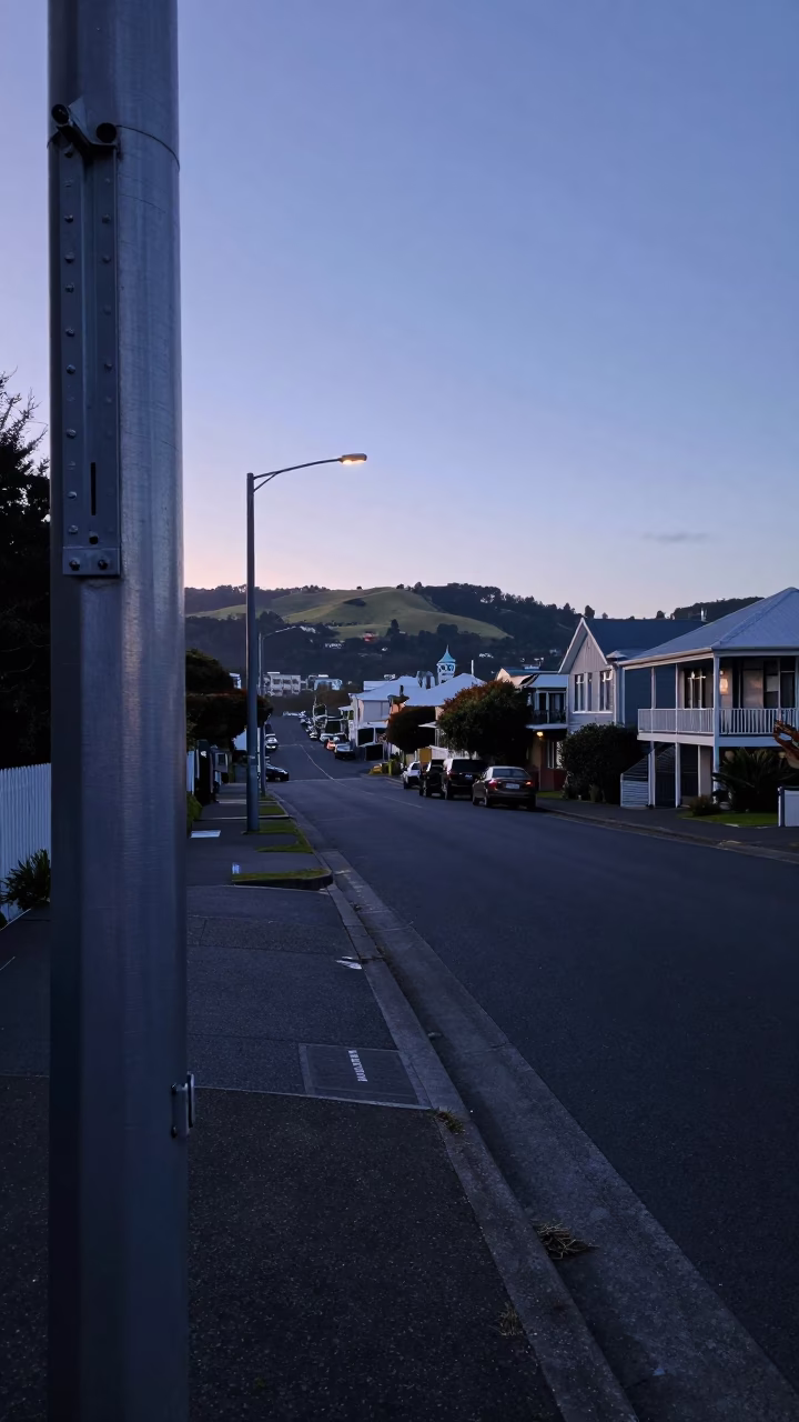 Pre-dawn Wellington street scene with brushed steel latch and quiet coastal ambiance in in Wellington, New Zealand