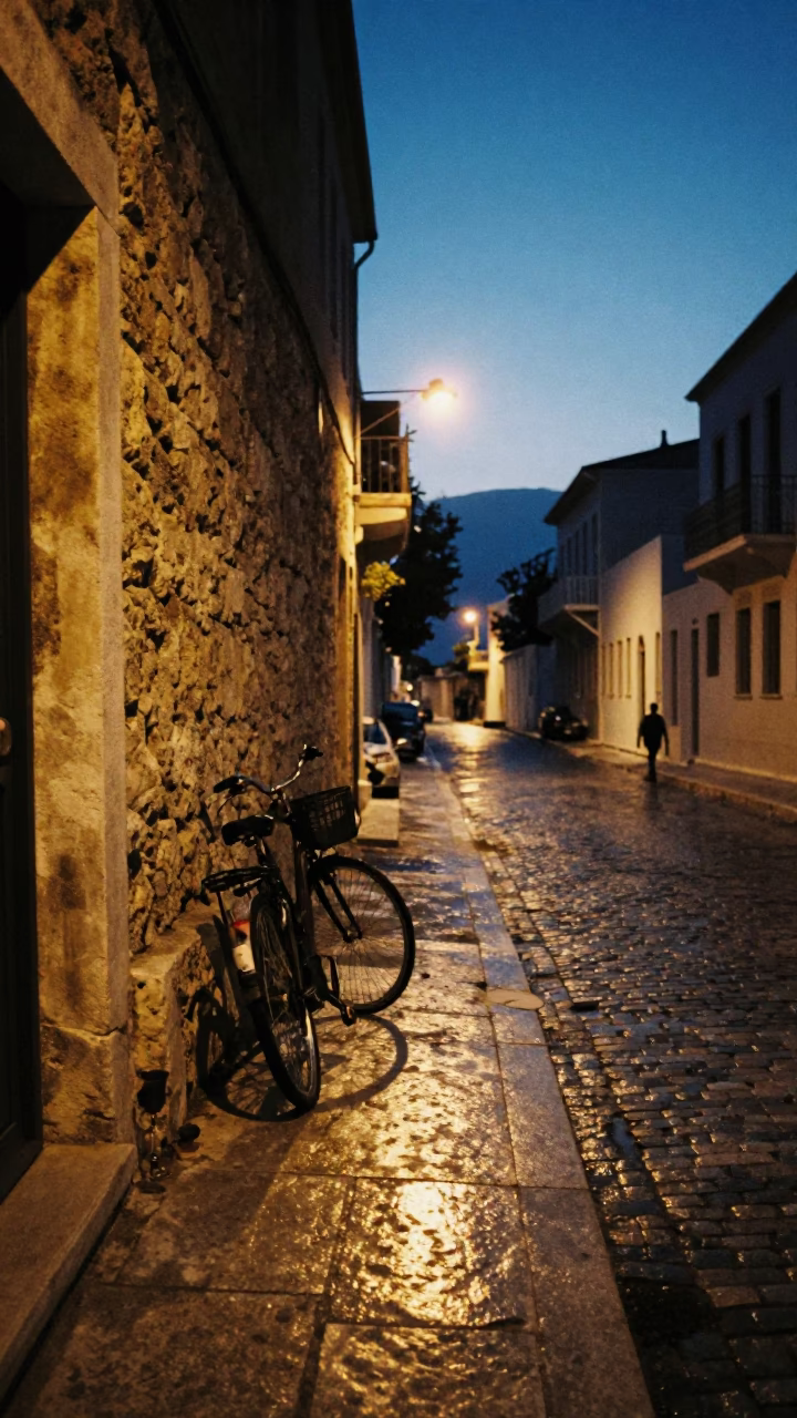 Predawn Athens Street Scene with Bicycle and Goblet on Cobblestones Near Ancient Ruins in in Athens, Greece