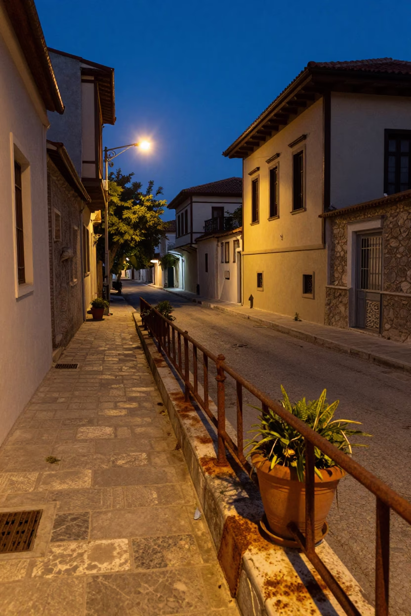 Predawn Athens Street Scene with Rusty Rail and Potted Herbs in Greek Neighborhood in in Athens, Greece