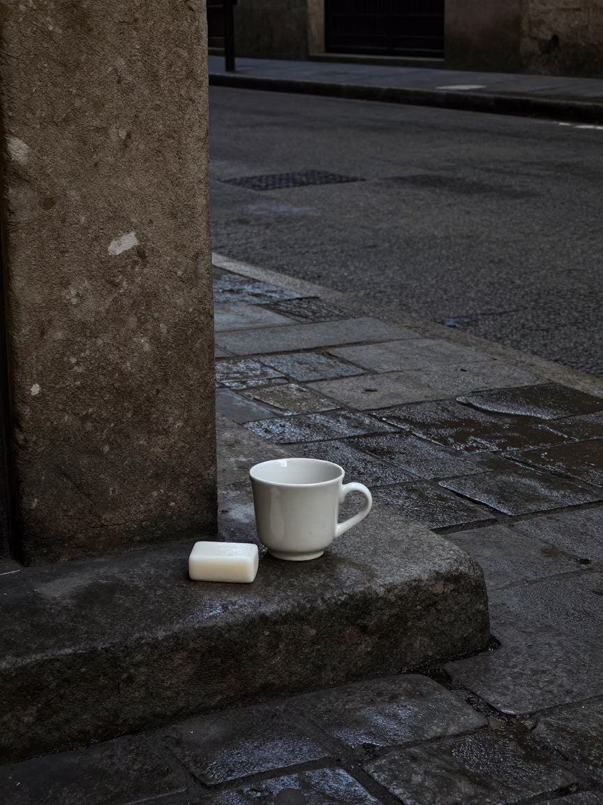 Predawn Barcelona Street Corner with Ceramic Cup and Soap Residue Drain in in Barcelona, Spain