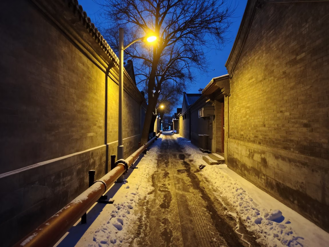 Predawn Beijing Street Scene with District Heating Pipes and Snow in in Beijing, China