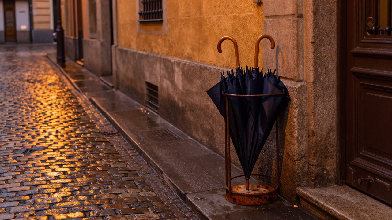 Predawn Bilbao Street Scene with Umbrella Stand and Step Stool in Rain in in Bilbao, Spain