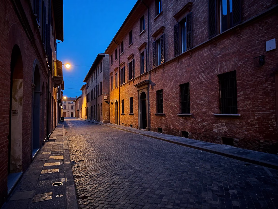 Predawn Bologna Street Scene with Cobblestones and Historic Architecture in Italy in in Bologna, Italy