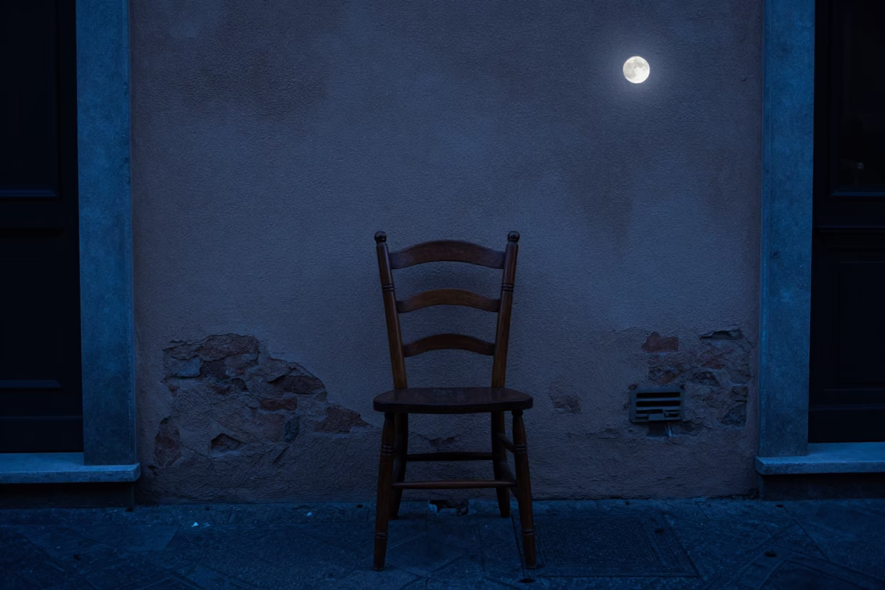 Predawn Bologna Street Scene with Spindle Chair and Moonlit Urban Details in in Bologna, Italy