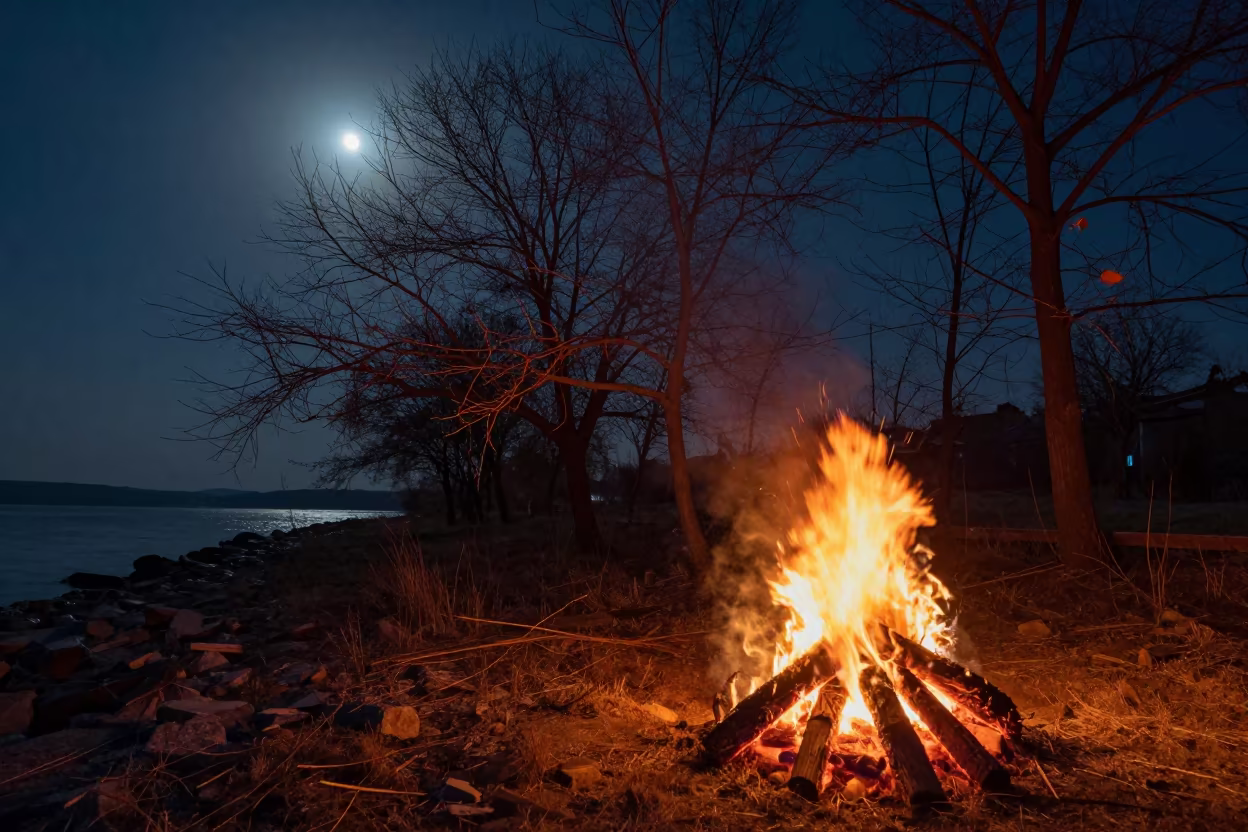Predawn Bonfire Silhouettes on Pristina Shoreline in along a wave-cut shoreline near Pristina
