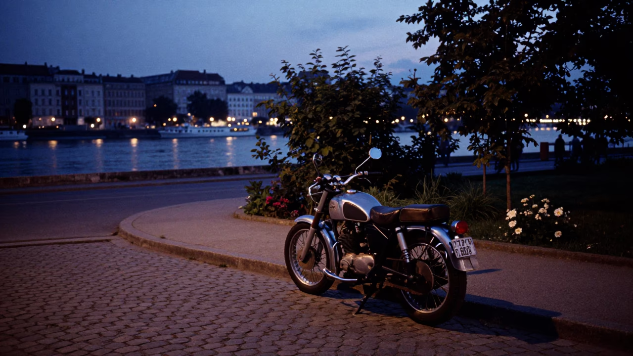 Predawn Budapest Street Scene with Vintage Motorcycle and Garden Rake in in Budapest, Hungary