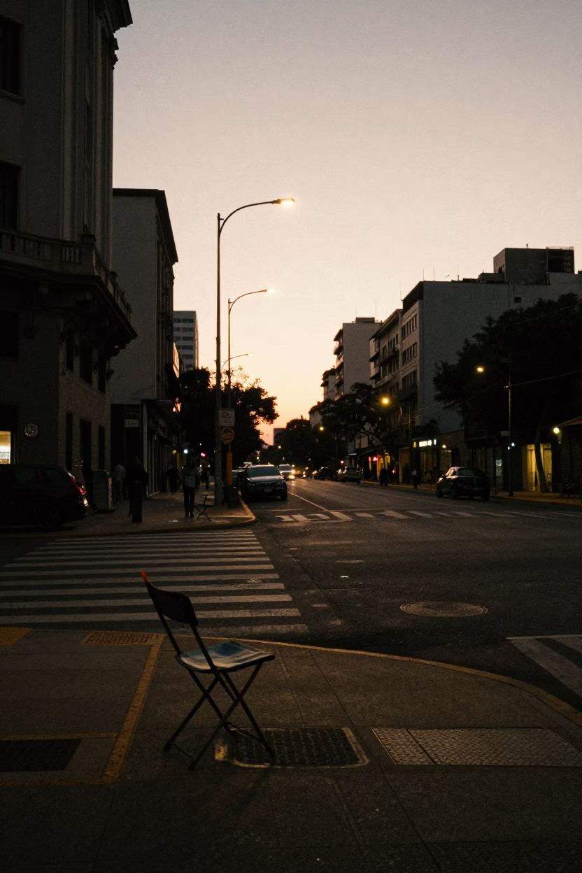 Predawn Buenos Aires Street Corner with Folding Chair and Finger Smudges on Glass in in Buenos Aires, Argentina