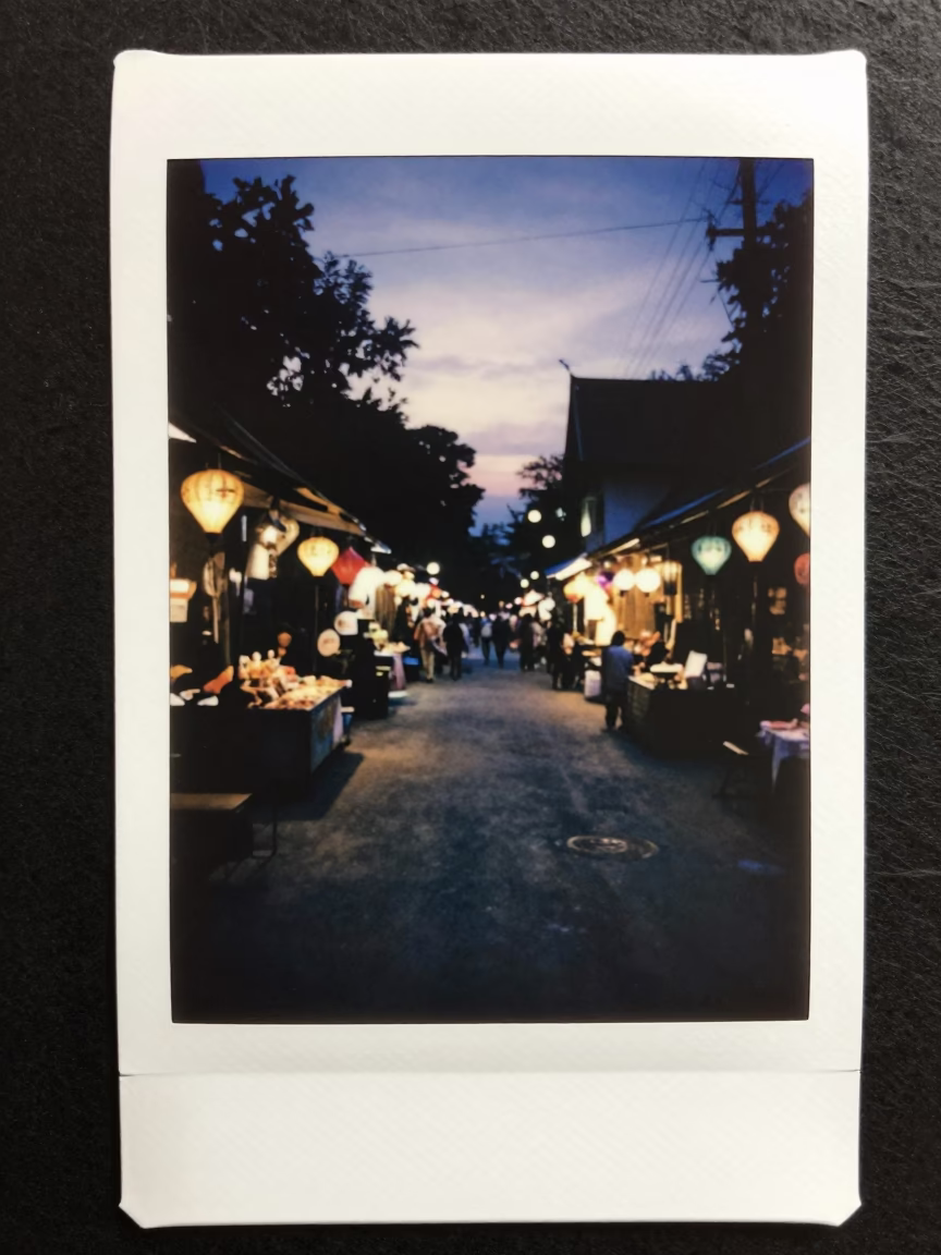 Predawn Chiang Mai Street Scene with Night Market Lanterns and Concrete Canal in in Chiang Mai, Thailand