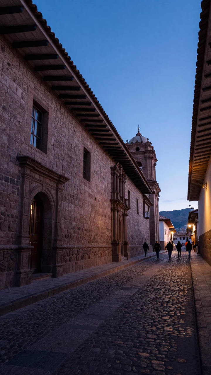Predawn Cusco Street Scene with Stone Walls and Morning Vendor Activity in in Cusco, Peru