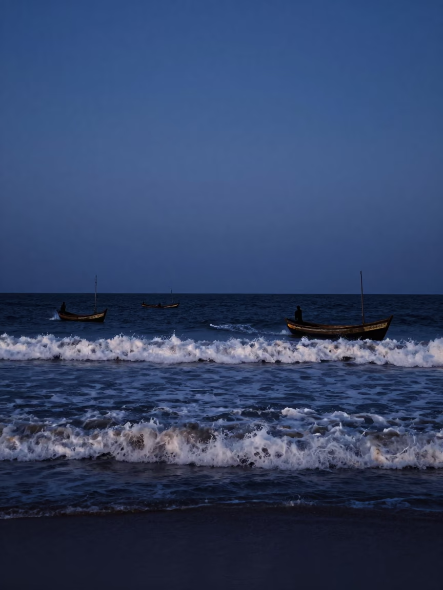 Predawn Dakar Senegal Coastline Fishing Boats Returning Through Crashing Surf Dark Sky in in Dakar, Senegal