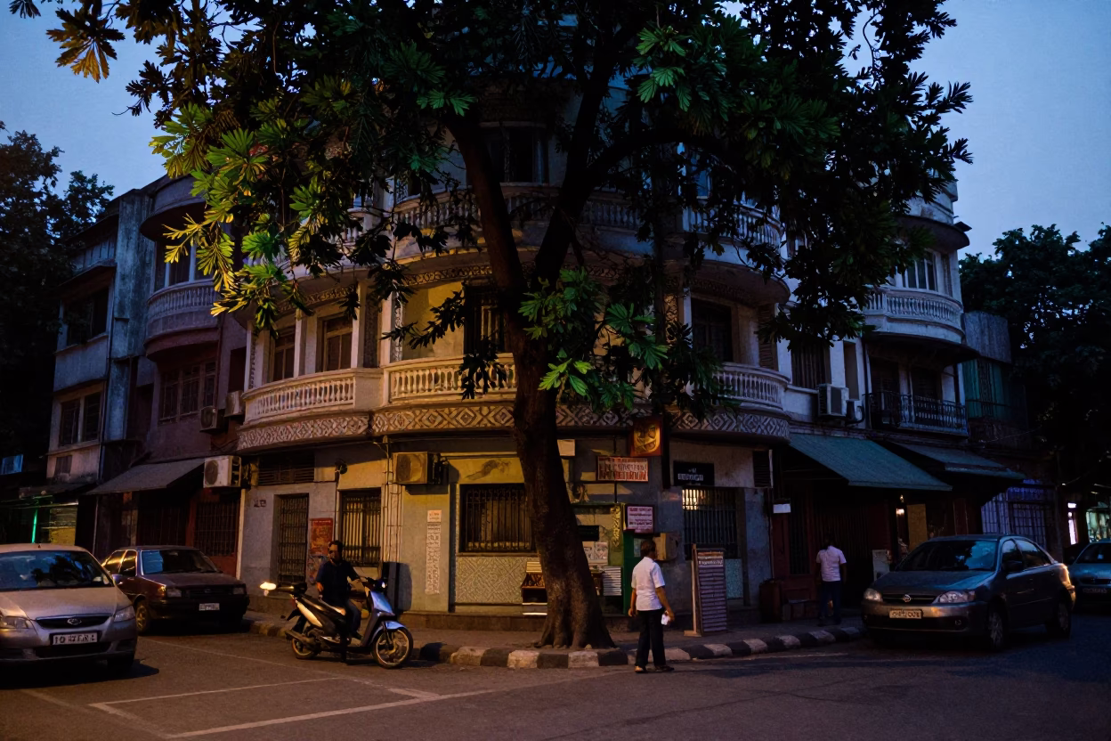 Predawn Delhi Street Scene with Tamarind Tree and Art Deco Hotel Facade in in Delhi, India