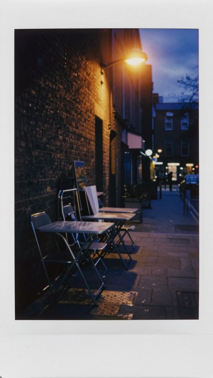 Predawn Dublin Street Scene with Folding Tables and Condensation in Rain in in Dublin, Ireland