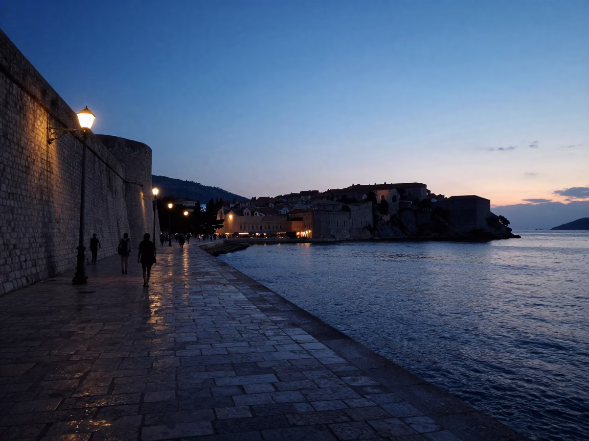 Predawn Dubrovnik Harbor Breakwater with Blue Hour Sky and Quiet Coastal Activity in in Dubrovnik, Croatia