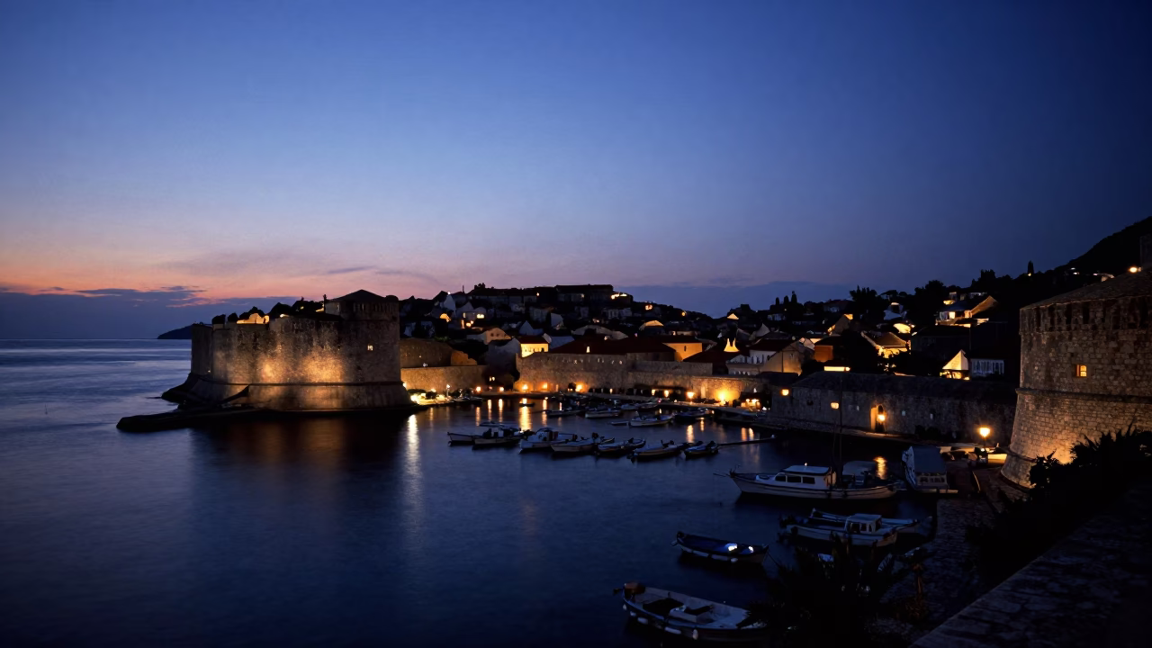Predawn Dubrovnik Harbor View with Stone Walls and Moored Boats in in Dubrovnik, Croatia