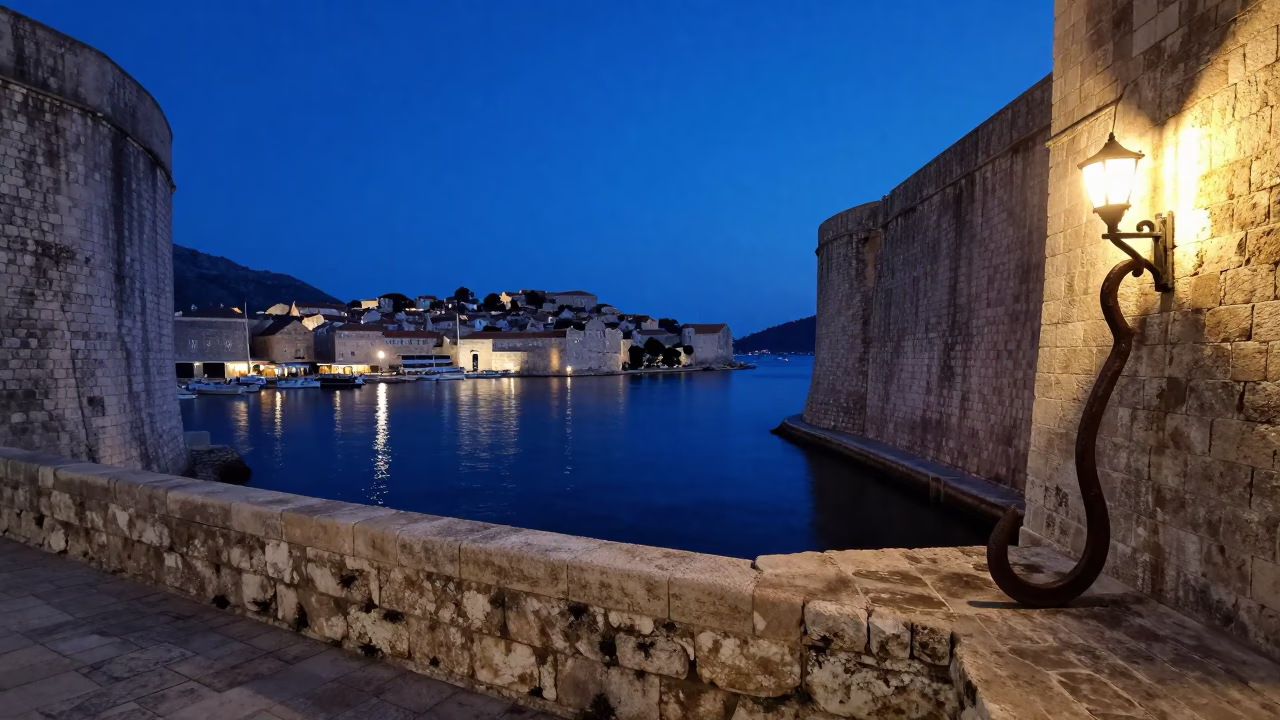 Predawn Dubrovnik Harbor with Iron Hook and Wall Sconce Lighting in in Dubrovnik, Croatia