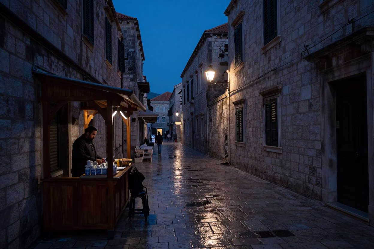 Predawn Dubrovnik Street Scene with Local Vendor and Wooden Flute in in Dubrovnik, Croatia