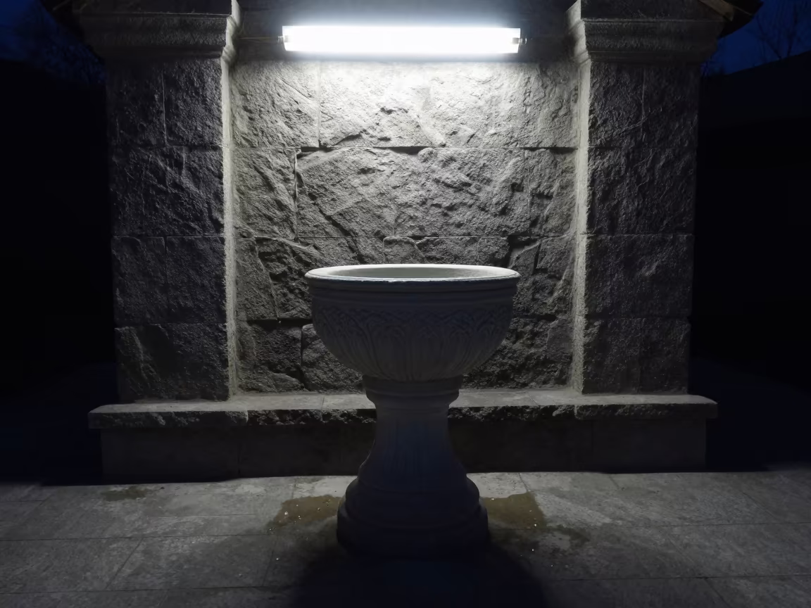Predawn Fluorescent Light on Stone Chapel Font in inside a stone chapel in Maykop