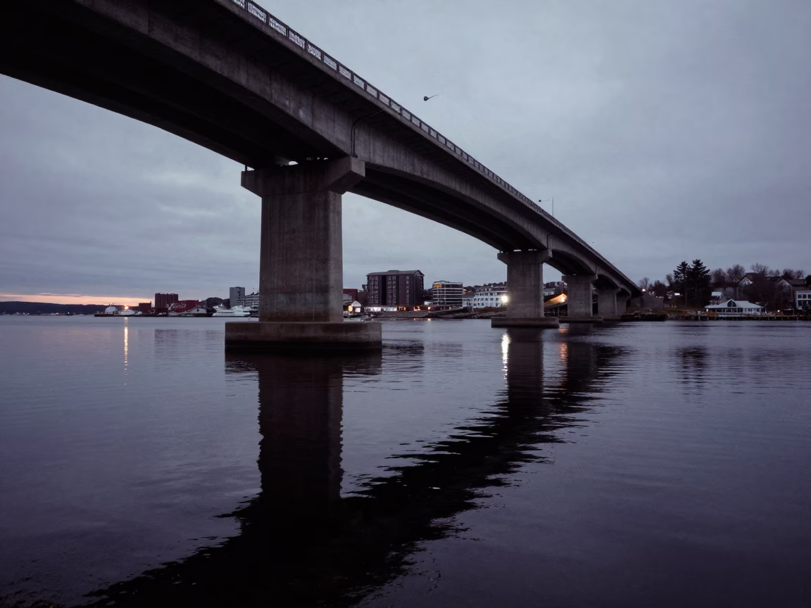 Predawn Harbor Scene Halifax Nova Scotia Bridge Pier Reflections and Cold Water in in Halifax, Nova Scotia, Canada