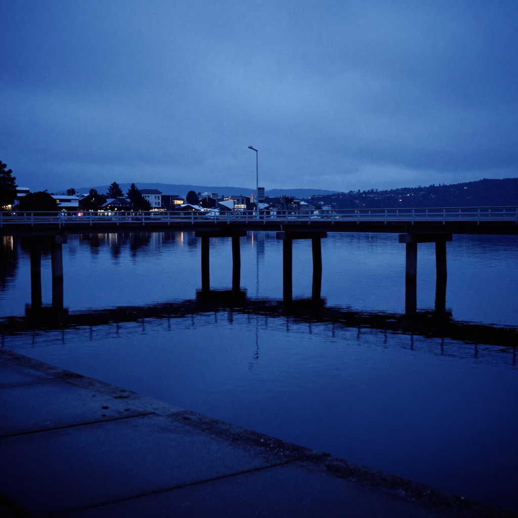 Predawn Hobart Waterfront Bridge Pier and Still Water Reflections in Tasmania in in Hobart, Tasmania, Australia