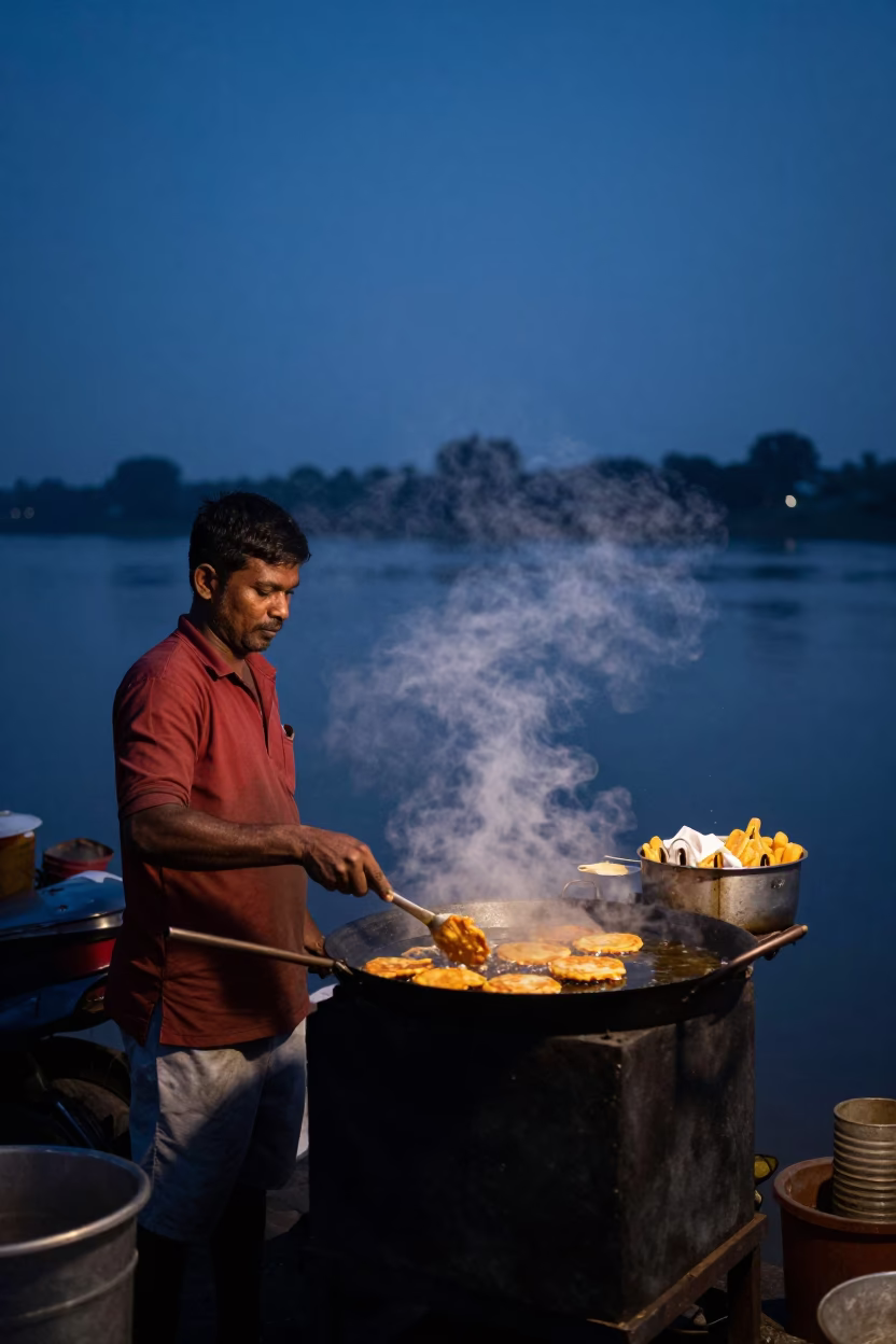 Predawn Kolkata Street Vendor Cooking Accra Fritters Near Hooghly River Bank in in Kolkata, India