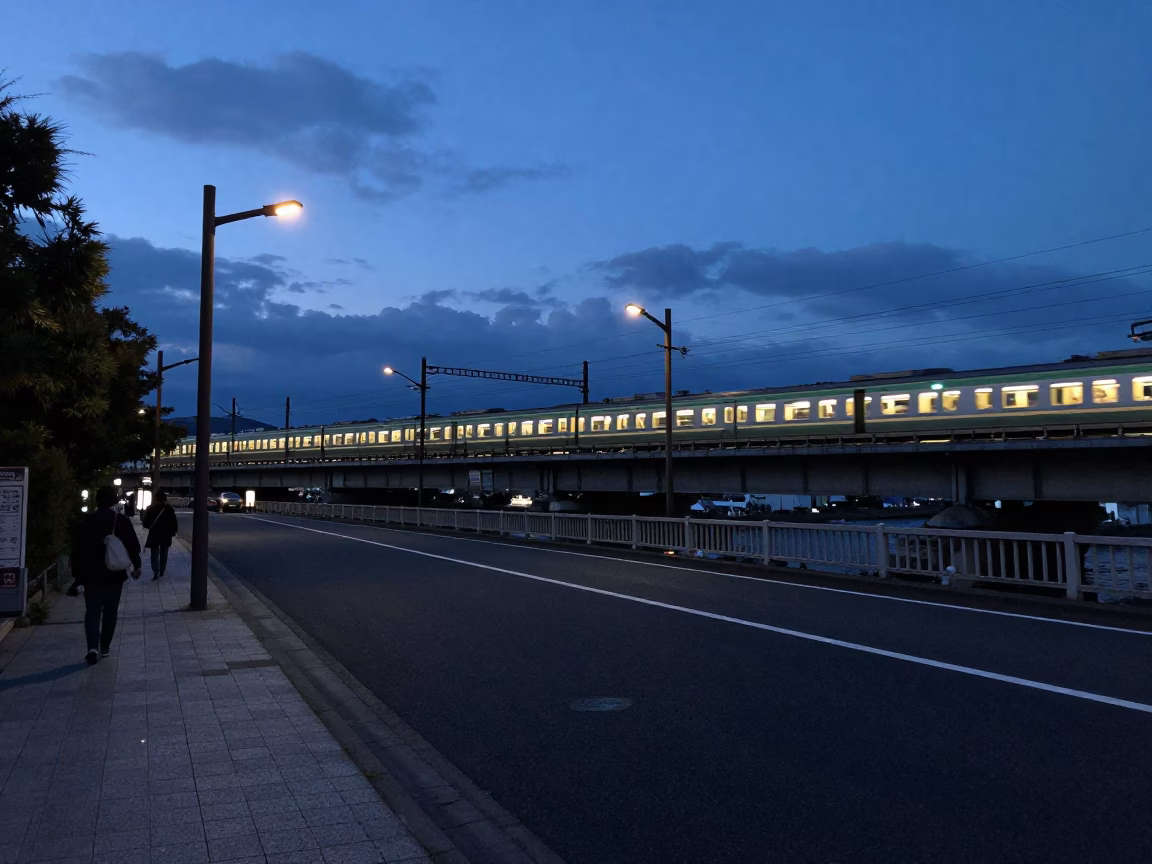 Predawn Kyoto Street Scene with Commuter Train Bridge and Local Morning Routine in in Kyoto, Japan
