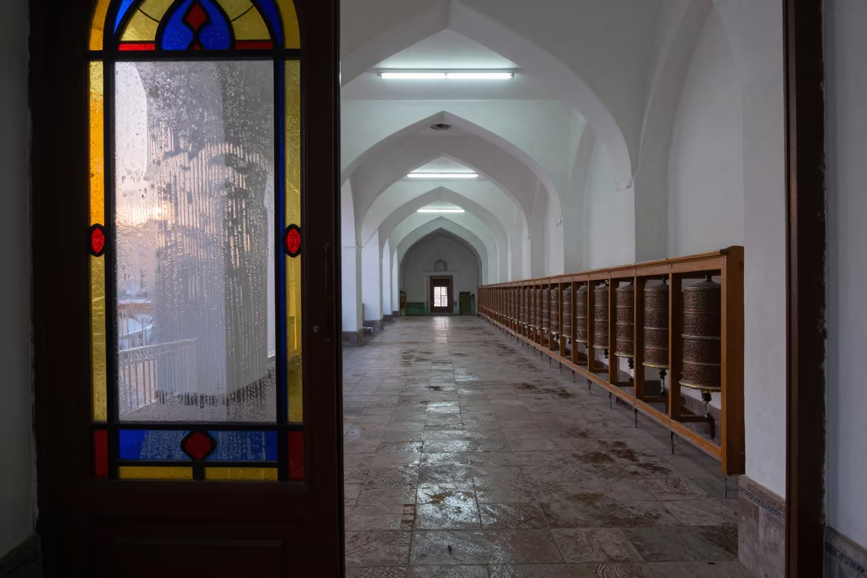 Predawn Light on Gurdwara Threshold After Rain in beside a prayer wheel corridor in Almaty