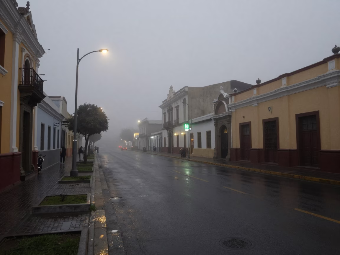 Predawn Lima Peru street scene with fog and distant lights in in Lima, Peru
