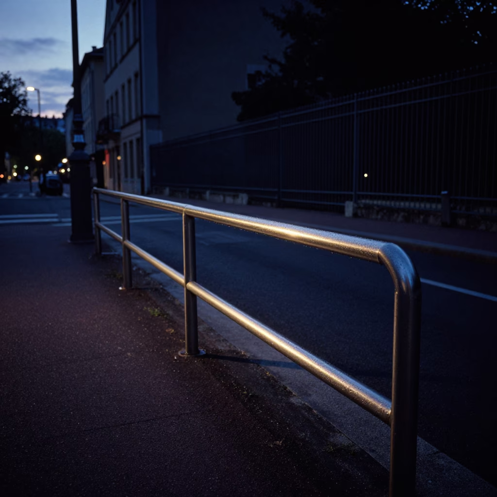 Predawn Lyon Street Scene with Brushed Steel Rail and Substation Fence in in Lyon, France