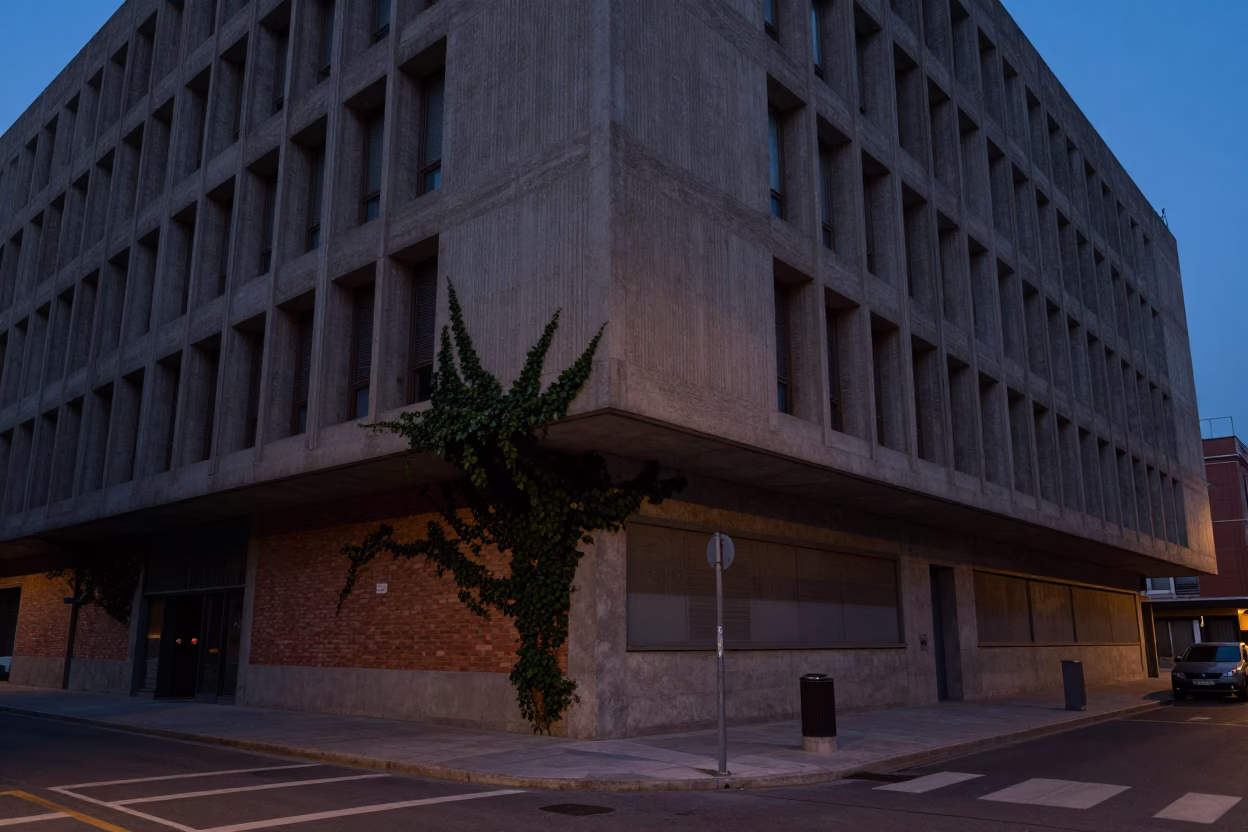 Predawn Madrid Street Scene with Concrete Brutalist University Building and Ivy in in Madrid, Spain