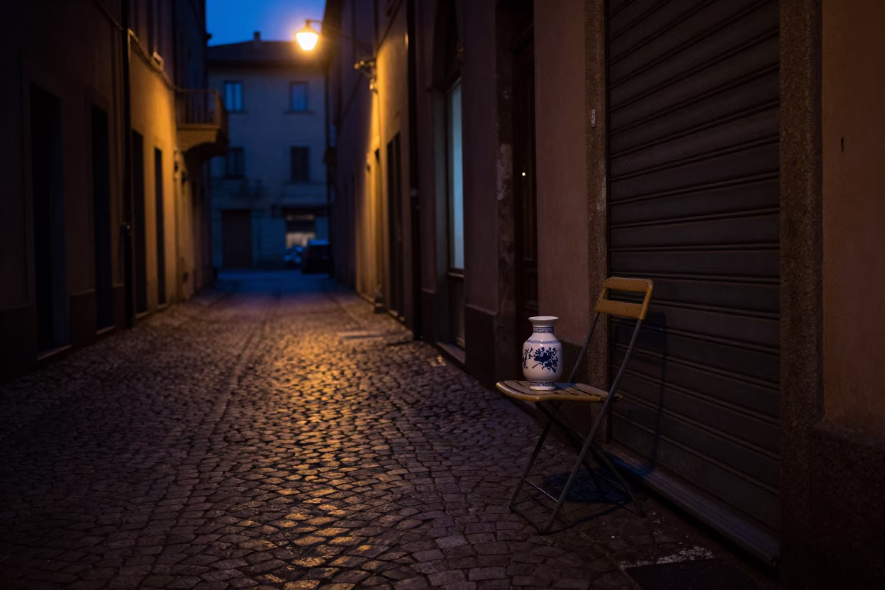 Predawn Milan Street Scene with Folding Chair and Ceramic Tiles in in Milan, Italy