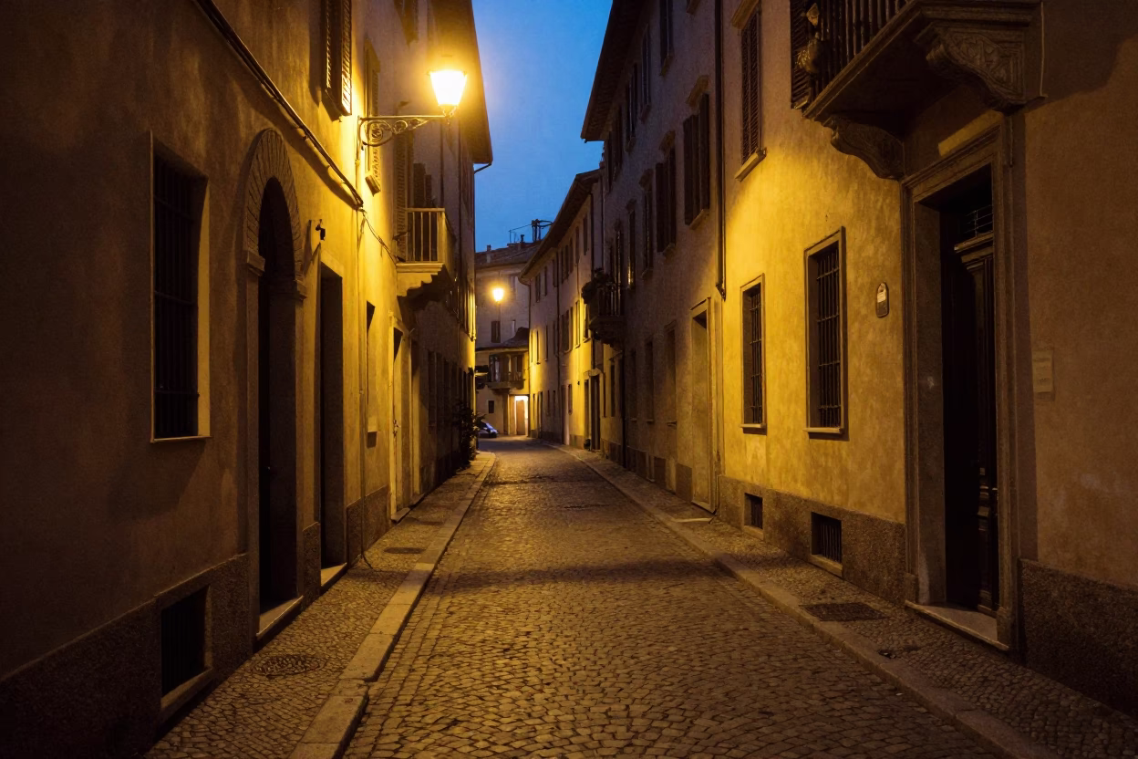 Predawn Milan street scene with shadows and urban details in in Milan, Italy