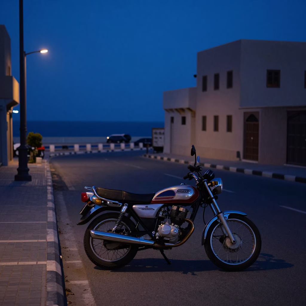 Predawn Muscat Street Scene with Motorcycle and Local Jar on Coastal Highway in in Muscat, Oman