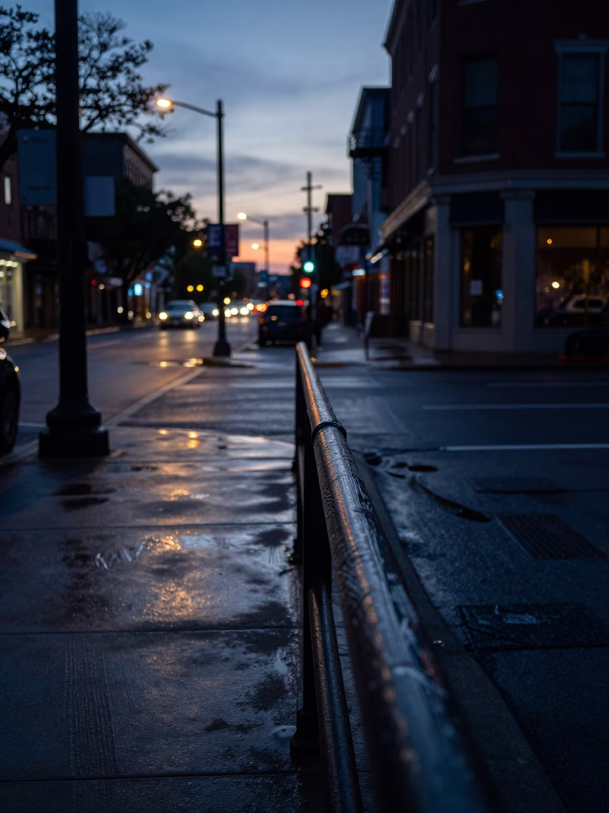Predawn Nashville Street Scene with Scratched Rail and Brushed Steel Bench in in Nashville, Tennessee, United States
