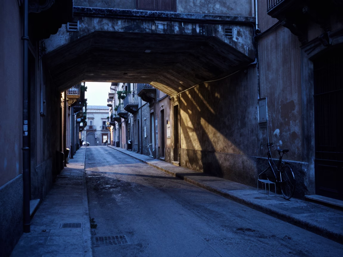 Predawn Palermo Street Scene with Flyover Shadows and Frost-Crusted Metal Wheel in in Palermo, Italy